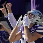 
              Kansas State wide receiver Kade Warner celebrates after scoring a touchdown during the first half of an NCAA college football game against Oklahoma State Saturday, Oct. 29, 2022, in Manhattan, Kan. (AP Photo/Charlie Riedel)
            