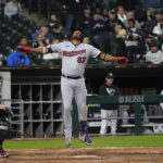 
              Minnesota Twins' Jermaine Palacios celebrates his home run off Chicago White Sox relief pitcher Jose Ruiz during the ninth inning of a baseball game Tuesday, Oct. 4, 2022, in Chicago. The White Sox won 8-3. (AP Photo/Charles Rex Arbogast)
            