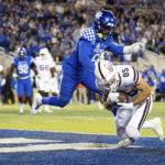
              Mississippi State wide receiver Austin Williams (85) falls into the end zone for a touchdown while being guarded by Kentucky defensive back Tyrell Ajian (6) during the second half of an NCAA college football game in Lexington, Ky., Saturday, Oct. 15, 2022. (AP Photo/Michael Clubb)
            