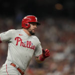 
              Philadelphia Phillies' Kyle Schwarber runs after hitting a single during the third inning in Game 2 of baseball's World Series between the Houston Astros and the Philadelphia Phillies on Saturday, Oct. 29, 2022, in Houston. (AP Photo/David J. Phillip)
            