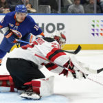 
              New York Islanders left wing Zach Parise (11) reaches for the puck as New Jersey Devils goaltender Mackenzie Blackwood (29) makes a save during the second period of an NHL hockey game Thursday, Oct. 20, 2022, in Elmont, N.Y. (AP Photo/Julia Nikhinson)
            