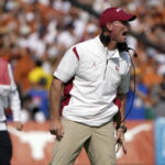 
              Oklahoma head coach Brent Venables yells during the first half of an NCAA college football game against the Texas at the Cotton Bowl in Dallas, Saturday, Oct. 8, 2022. (AP Photo/LM Otero)
            