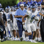 
              North Carolina's Kobe Paysour (8) runs after a reception during the second half of the team's NCAA college football game against Duke in Durham, N.C., Saturday, Oct. 15, 2022. (AP Photo/Ben McKeown)
            