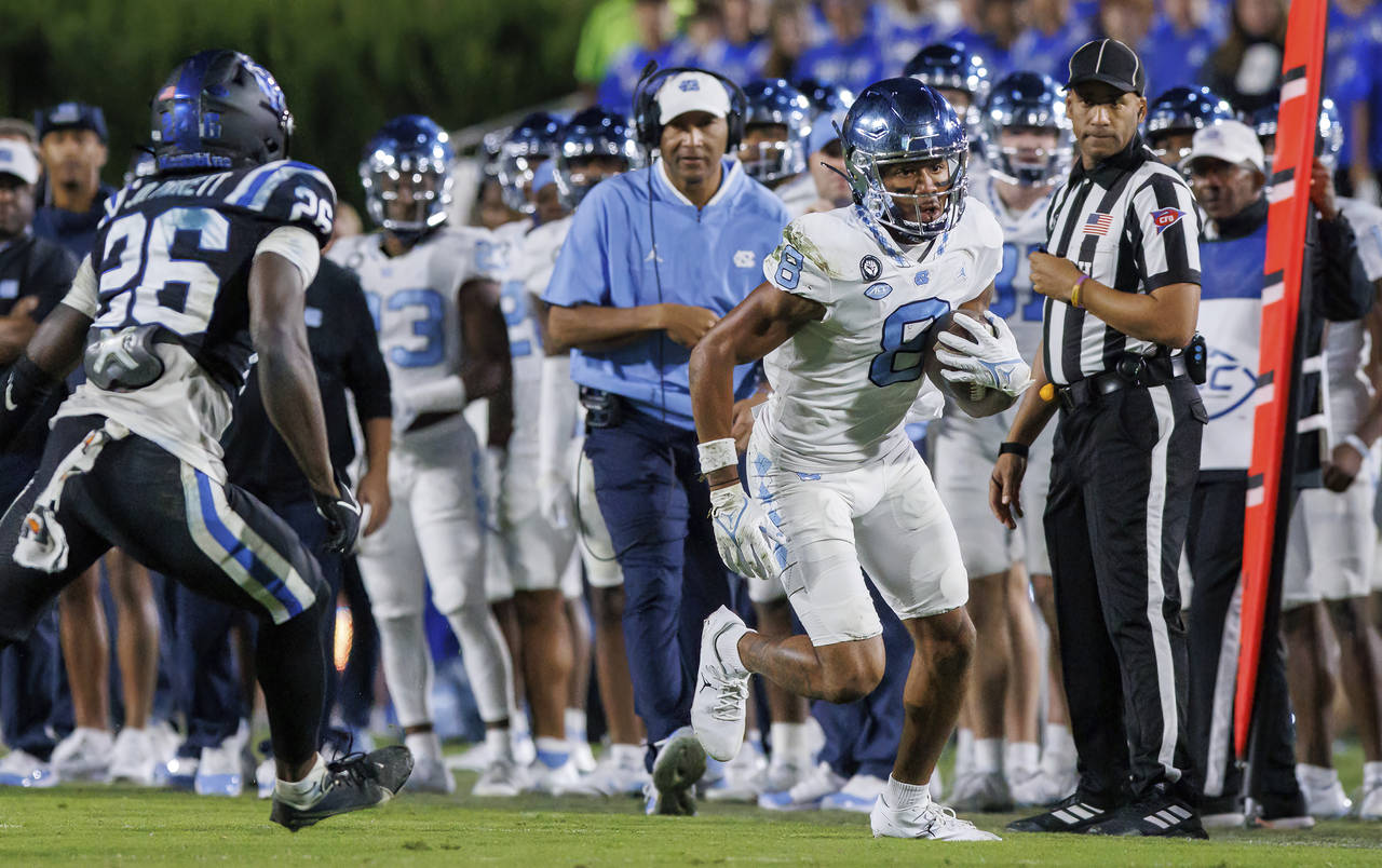 North Carolina's Kobe Paysour (8) runs after a reception during the second half of the team's NCAA ...