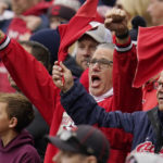 
              Cleveland Guardians fans cheer before at a wild card baseball playoff game against the Tampa Bay Rays, Friday, Oct. 7, 2022, in Cleveland. (AP Photo/Sue Ogrocki)
            