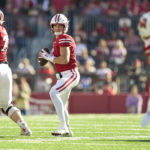 
              Wisconsin quarterback Graham Mertz (5) looks to pass against Purdue during the first half of an NCAA college football game Saturday, Oct. 22, 2022, in Madison, Wis. Wisconsin won 35-24. (AP Photo/Andy Manis)
            