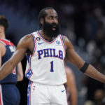 
              Philadelphia 76ers guard James Harden reacts after being fouled by Washington Wizards forward Deni Avdija, back left, of Israel, while shooting in the first half of an NBA basketball game, Monday, Oct. 31, 2022, in Washington. (AP Photo/Patrick Semansky)
            