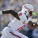 
              Houston wide receiver KeSean Carter runs a route against Navy during the first half of an NCAA college football game, Saturday, Oct. 22, 2022, in Annapolis, Md. (AP Photo/Julio Cortez)
            