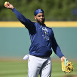 
              Tampa Bay Rays third baseman Yandy Diaz throws during workouts the day before their wild card baseball playoff game against the Cleveland Guardians, Thursday, Oct. 6, 2022, in Cleveland. (AP Photo/David Dermer)
            