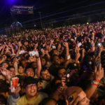 
              FILE - The crowd watches as Travis Scott performs at Astroworld Festival at NRG park on Friday, Nov. 5, 2021 in Houston. Several people died and numerous others were injured in what officials described as a surge of the crowd at the music festival while Scott was performing. (Jamaal Ellis/Houston Chronicle via AP, File)
            