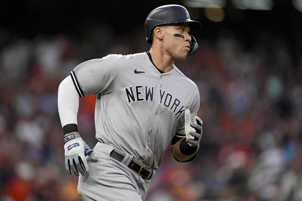 New York Yankees Aaron Judge (99) watches his ball fly out during the first inning in Game 2 of bas...