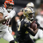 
              New Orleans Saints wide receiver Rashid Shaheed (89) runs past Cincinnati Bengals' Mike Thomas (80) for a touchdown during the first half of an NFL football game in New Orleans, Sunday, Oct. 16, 2022. (AP Photo/Gerald Herbert)
            