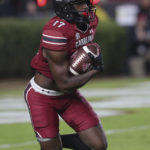 
              South Carolina's Xavier Legette returns the opening kickoff for a 100-yard touchdown during the first half of the team's NCAA college football game against Texas A&M on Saturday, Oct. 22, 2022, in Columbia, S.C. (AP Photo/Artie Walker Jr.)
            