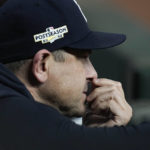 
              New York Yankees manager Aaron Boone watches play from the dugout during the ninth inning in Game 2 of baseball's American League Championship Series between the Houston Astros and the New York Yankees, Thursday, Oct. 20, 2022, in Houston. (AP Photo/Kevin M. Cox)
            
