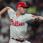 
              Philadelphia Phillies relief pitcher Andrew Bellatti (64) delivers during the seventh inning in Game 2 of baseball's National League Division Series between the Atlanta Braves and the Philadelphia Phillies, Wednesday, Oct. 12, 2022, in Atlanta. (AP Photo/John Bazemore)
            