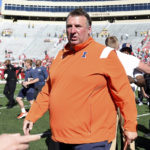 
              Illinois head coach Bret Bielema walks off the field following a 34-10 win over Wisconsin in an NCAA college football game Saturday, Oct. 1, 2022, in Madison, Wis. (AP Photo/Kayla Wolf)
            