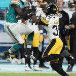 
              Miami Dolphins wide receiver Tyreek Hill (10) grabs a pass as Pittsburgh Steelers cornerback Arthur Maulet (35) defends during the first half of an NFL football game, Sunday, Oct. 23, 2022, in Miami Gardens, Fla. (AP Photo/Wilfredo Lee )
            