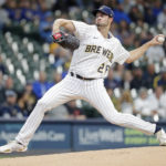 
              Milwaukee Brewers starting pitcher Aaron Ashby throws against the Miami Marlins during the first inning of a baseball game Saturday, Oct. 1, 2022, in Milwaukee. (AP Photo/Jon Durr)
            