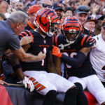 
              Cincinnati Bengals wide receiver Ja'Marr Chase (1) celebrates his touchdown with wide receiver Tyler Boyd and fans in the first half of an NFL football game against the Atlanta Falcons in Cincinnati, Sunday, Oct. 23, 2022. (AP Photo/Jeff Dean)
            