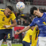 
              FILE - Ecuador's Byron Castillo, left, and Japan's Shogo Taniguchi challenge for the ball during the international friendly soccer match between Japan and Ecuador as part of the Kirin Challenge Cup in Duesseldorf, Germany, Tuesday, Sept. 27, 2022. (AP Photo/Martin Meissner, File)
            