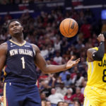 
              New Orleans Pelicans forward Zion Williamson (1) reacts after making a basket against Utah Jazz forward Jarred Vanderbilt (8) and looking to an official for a foul in the first half of an NBA basketball game in New Orleans, Sunday, Oct. 23, 2022. (AP Photo/Gerald Herbert)
            