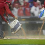 
              The grounds crew works the field during the seventh inning in Game 5 of the baseball NL Championship Series between the San Diego Padres and the Philadelphia Phillies on Sunday, Oct. 23, 2022, in Philadelphia. (AP Photo/Matt Slocum)
            