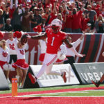 
              Utah's Clark Phillips III (1) glides into the end zone for a touchdown after intercepting a pass during an NCAA college football game against Oregon State, Saturday, Oct. 1, 2022, in Salt Lake City.  (Scott G Winterton,/The Deseret News via AP)
            