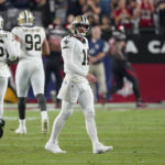 
              New Orleans Saints quarterback Andy Dalton (14) reacts after throwing his second interception that was returned for a touchdown, during the first half of an NFL football game against the Arizona Cardinals, Thursday, Oct. 20, 2022, in Glendale, Ariz. (AP Photo/Matt York)
            