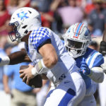 
              Mississippi linebacker Austin Keys (11) sacks Kentucky quarterback Will Levis (7) during the first half of an NCAA college football game in Oxford, Miss., Saturday, Oct. 1, 2022. (AP Photo/Thomas Graning)
            