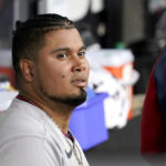 
              Minnesota Twins' Luis Arraez looks out from the dugout after being pulled from the game during the third inning of a baseball game against the Chicago White Sox Wednesday, Oct. 5, 2022, in Chicago. (AP Photo/Nam Y. Huh)
            