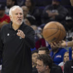 
              San Antonio Spurs head coach Greg Popovich shouts at a referee in the first half of an NBA basketball game against the Philadelphia 76ers, Saturday, Oct. 22, 2022, in Philadelphia. (AP Photo/Laurence Kesterson)
            