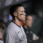 
              New York Yankees center fielder Aaron Judge (99) watches play from the dugout during the ninth inning in Game 1 of baseball's American League Championship Series between the Houston Astros and the New York Yankees, Wednesday, Oct. 19, 2022, in Houston. The Houston Astros won 4-2. (AP Photo/Kevin M. Cox)
            