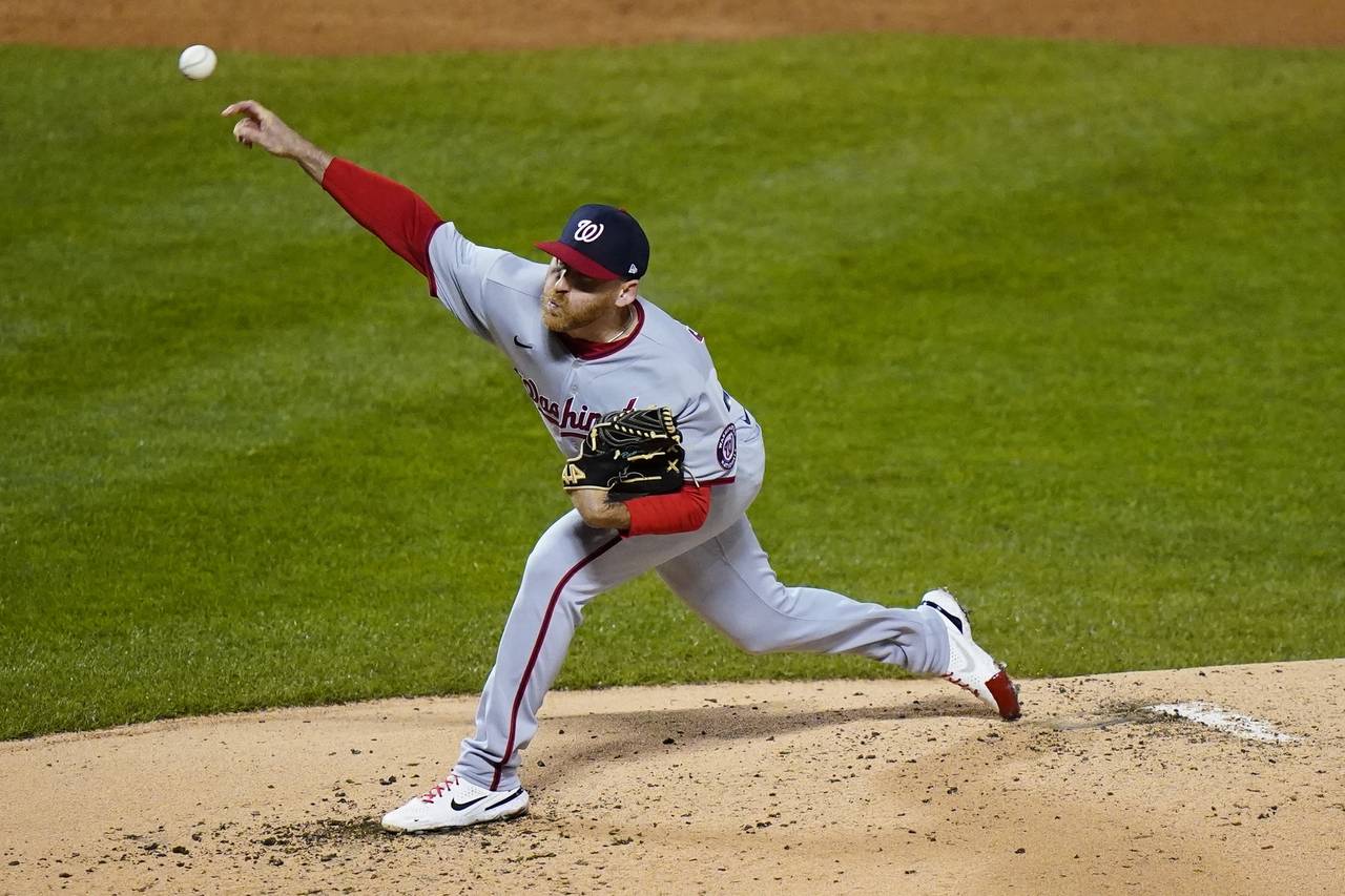 Washington Nationals' Reed Garrett pitches during the first inning in the second baseball game of t...