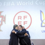 
              Portuguese Soccer Federation President Fernando Gomes, left, President of the Spanish Royal Federation of Soccer (RFEF), Luis Rubiales, right, Ukrainian Football Federation President Andriy Pavelko, center, welcome during a press conference about the announcing that Ukraine is joining Spain and Portugal in their joint bid to host the World Cup in 2030, at the UEFA Headquarters, in Nyon, Switzerland, Wednesday, October 5, 2022. The proposal harnesses the idea that football can restore hope and peace, while Ukraine has been at war with Russia for months. (Martial Trezzini/Keystone via AP)
            
