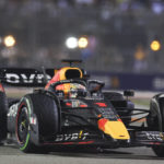 
              Red Bull driver Max Verstappen of the Netherlands steers his car during the Singapore Formula One Grand Prix, at the Marina Bay City Circuit in Singapore, Sunday, Oct.2, 2022. (AP Photo/Danial Hakim)
            