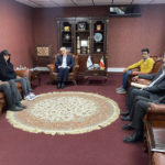 
              In this photo released by Iran's Ministry of Sport and Youth, Minister of Sport and Youth Hamid Sajjadi, center, meets with climber Elnaz Rekabi, second left, in Tehran, Iran, Wednesday, Oct. 19, 2022. Rekabi returned to Tehran early Wednesday after competing in South Korea without wearing a headscarf, an act widely seen as support for anti-government demonstrators amid weeks of protests over the Islamic Republic's mandatory hijab. Others are unidentified. (Ministry of Sport and Youth via AP)
            