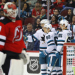 
              San Jose Sharks right wing Kevin Labanc (62) celebrates with teammates after scoring a goal against New Jersey Devils goaltender Mackenzie Blackwood (29) during the second period of an NHL hockey game, Saturday, Oct. 22, 2022 in Newark, N.J. (AP Photo/Noah K. Murray)
            