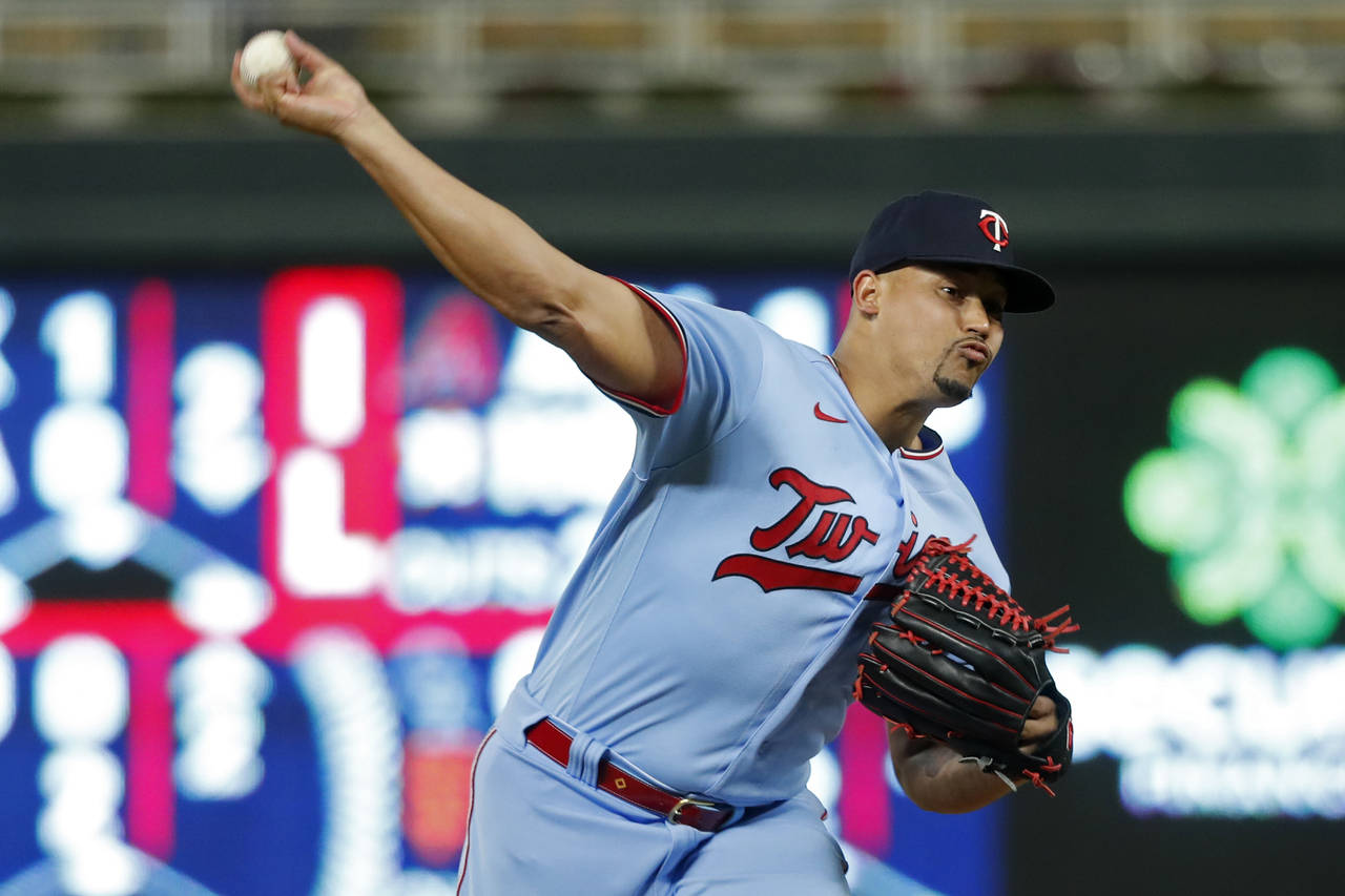 Minnesota Twins relief pitcher Jhoan Duran throws to the Chicago White Sox in the ninth inning of a...