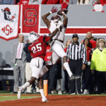 
              North Carolina State's Shyheim Battle (25) breaks up a pass intended for Florida State's Malik McClain (11) during the first half of an NCAA college football game in Raleigh, N.C., Saturday, Oct. 8, 2022. (AP Photo/Karl B DeBlaker)
            