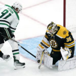 
              Boston Bruins goaltender Linus Ullmark (35) makes a save on a shot by Dallas Stars center Tyler Seguin (91) during the second period of an NHL hockey game, Tuesday, Oct. 25, 2022, in Boston. (AP Photo/Charles Krupa)
            