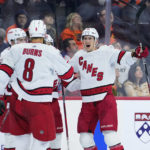 
              Carolina Hurricanes' Martin Necas, right, celebrates with teammates after scoring a goal during the third period of an NHL hockey game against the Philadelphia Flyers, Saturday, Oct. 29, 2022, in Philadelphia. (AP Photo/Matt Slocum)
            