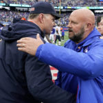 
              Chicago Bears head coach Matt Eberflus, left, and New York Giants head coach Brian Daboll meet on the field after the Giants defeating the Bears 20-12 in an NFL football game, Sunday, Oct. 2, 2022, in East Rutherford, N.J. (AP Photo/John Minchillo)
            