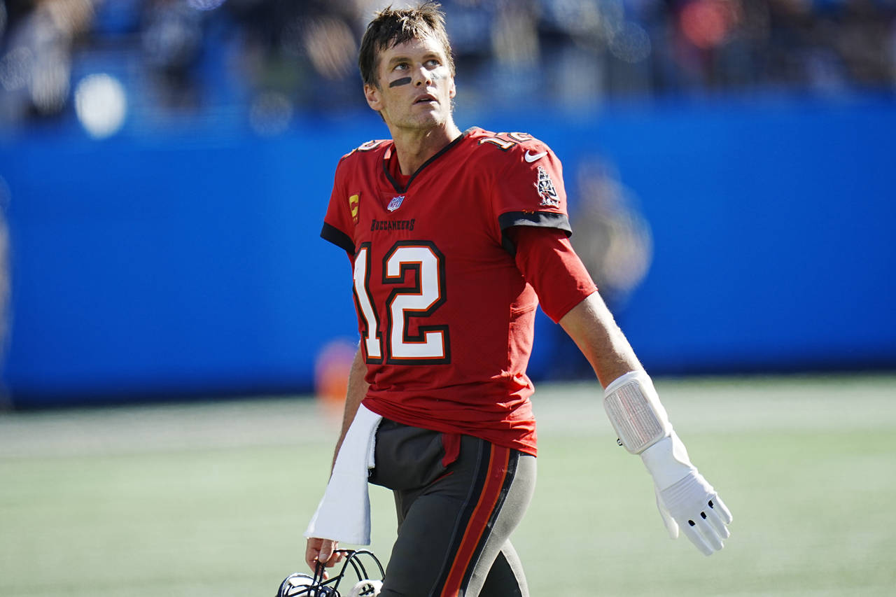 Tampa Bay Buccaneers quarterback Tom Brady (12) looks at the scoreboard after failing to convert a ...