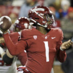 
              Washington State quarterback Cameron Ward throws a pass during the first half of an NCAA college football game against Utah, Thursday, Oct. 27, 2022, in Pullman, Wash. (AP Photo/Young Kwak)
            