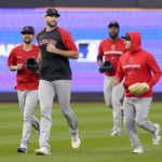 
              Cleveland Guardians players warm up on the field before Game 5 of an American League Division baseball series against the New York Yankees, Monday, Oct. 17, 2022, in New York. (AP Photo/Frank Franklin II)
            