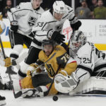 
              Los Angeles Kings goaltender Pheonix Copley (29) blocks an attempted shot by Vegas Golden Knights' Gage Quinney (72) during the second period of an NHL preseason hockey game Monday, Sept. 26, 2022, in Las Vegas. (AP Photo/John Locher)
            
