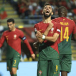
              FILE - Portugal's Bruno Fernandes reacts after missing a scoring chance during the UEFA Nations League soccer match between Portugal and Spain at the Municipal Stadium in Braga, Portugal, Tuesday, Sept. 27, 2022. (AP Photo/Luis Vieira, File)
            