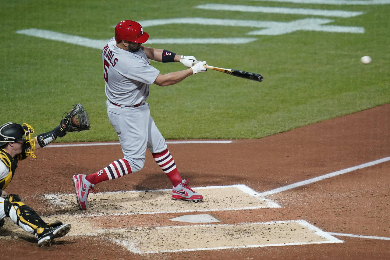 St. Louis Cardinals' Albert Pujols hits a two-run single against the Pittsburgh Pirates during the ...