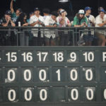 
              Seattle Mariners fans react after the Houston Astros scored during the 18th inning in Game 3 of an American League Division Series baseball game Saturday, Oct. 15, 2022, in Seattle. (AP Photo/Ted S. Warren)
            