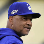 
              Los Angeles Dodgers manager Dave Roberts watches batting practice during a workout in preparation for Game 1 of a baseball NL Division Series, Friday, Oct. 7, 2022, in Los Angeles. The Dodgers will face the winner of the wild-card series between the San Diego Padres and the New York Mets. (AP Photo/Marcio Jose Sanchez)
            